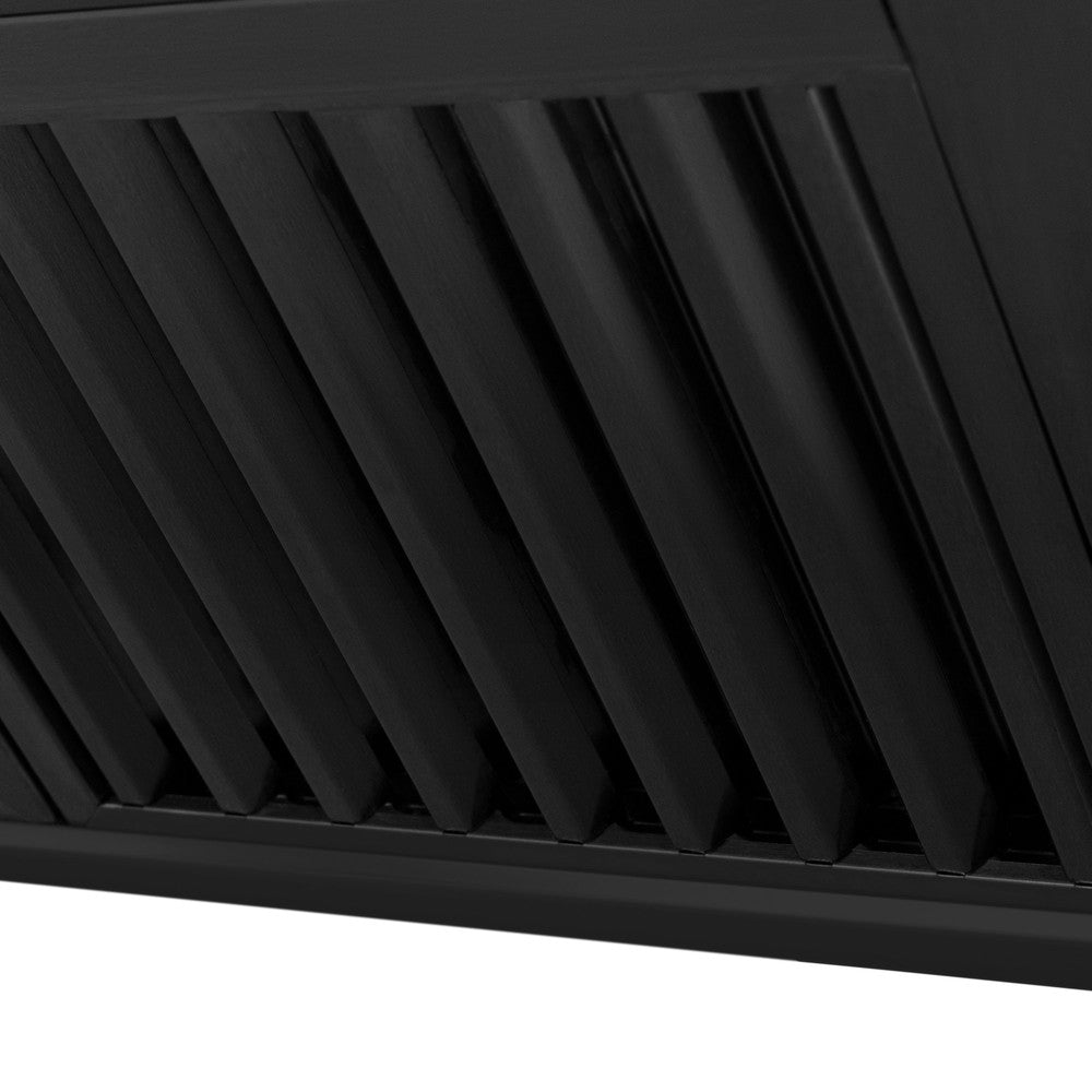 Range hood features dishwasher-safe stainless steel baffle filters.