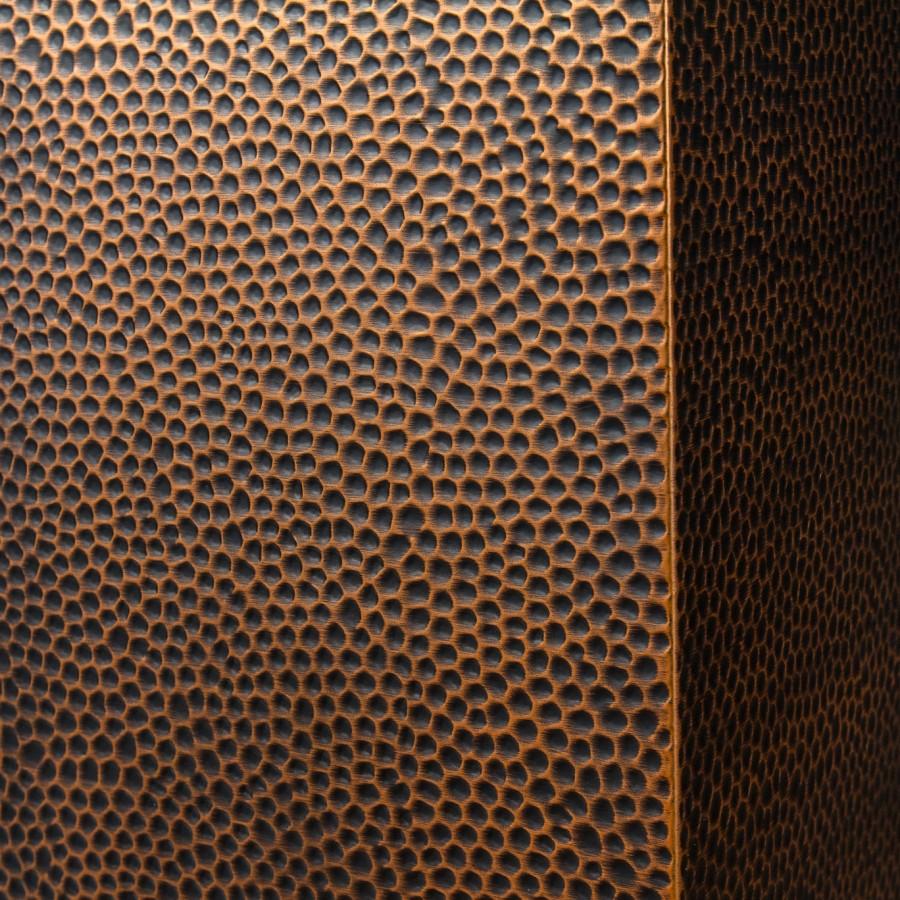 ZLINE Designer Series Hand-Hammered Wall Mount Range Hood (8KBH) close-up, hand-hammered copper finish.
