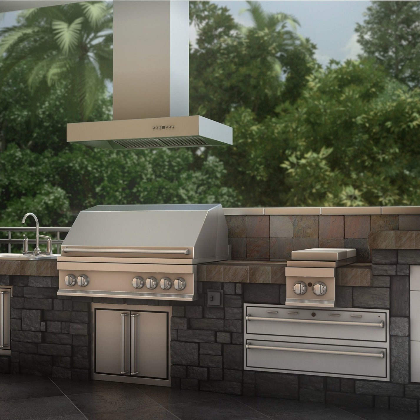 ZLINE Ducted Outdoor Island Mount Range Hood in Stainless Steel (KECOMi-304) rendering outside above barbecue in a stone patio kitchen.
