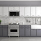 ZLINE Stainless Steel Over the Range Convection Microwave Oven with Modern Handle (MWO-OTR-30) in a modern luxury kitchen over a range