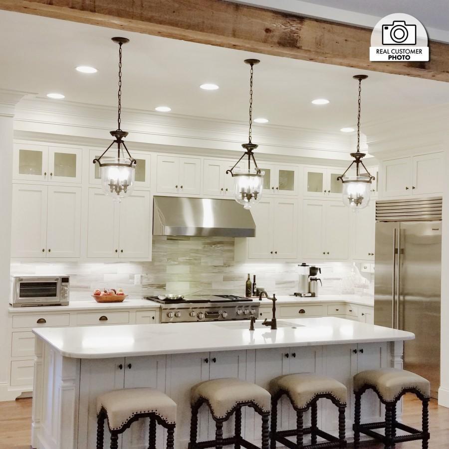 Under cabinet range hood in a cottage-style kitchen
