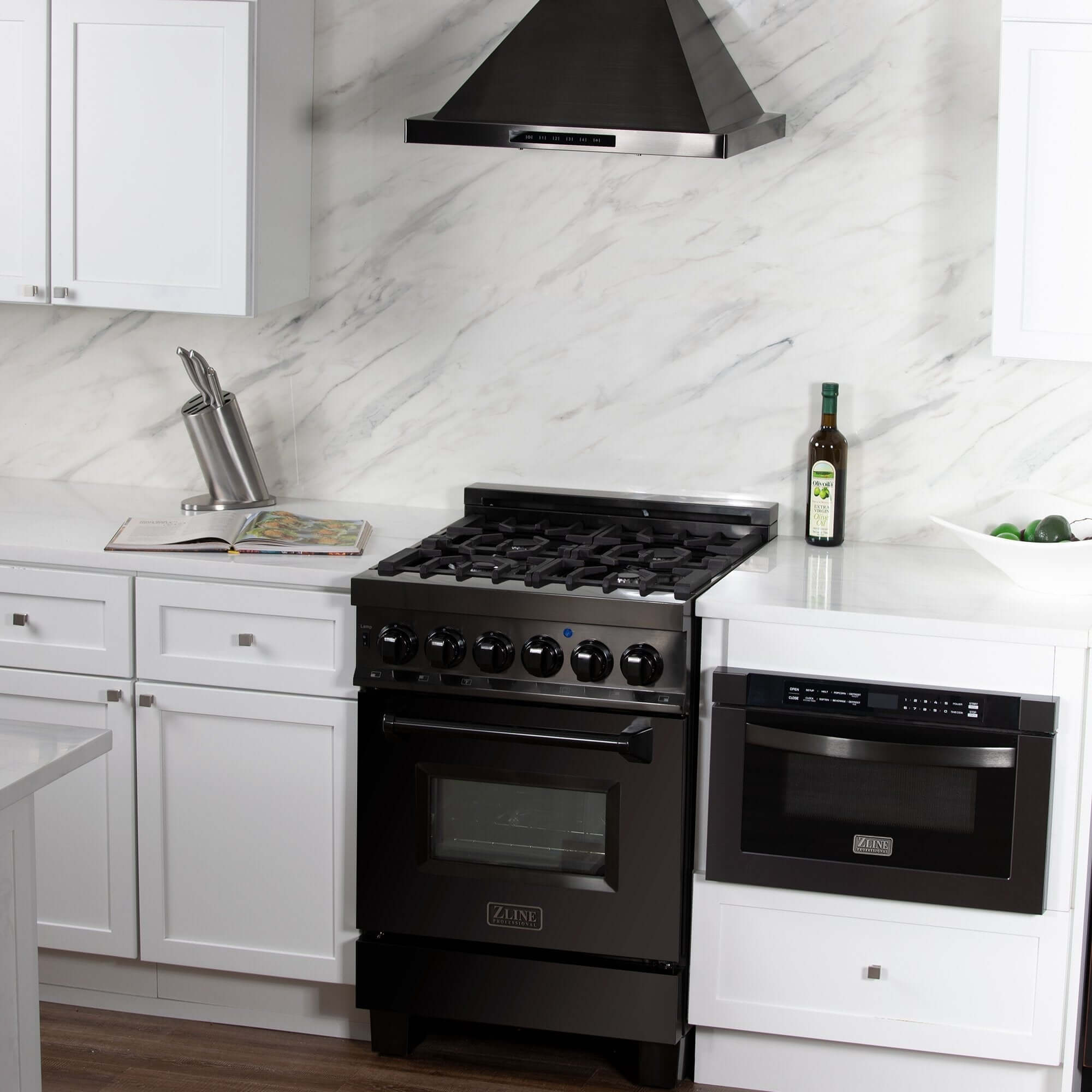 ZLINE black stainless steel appliances in a white cottage-style kitchen.