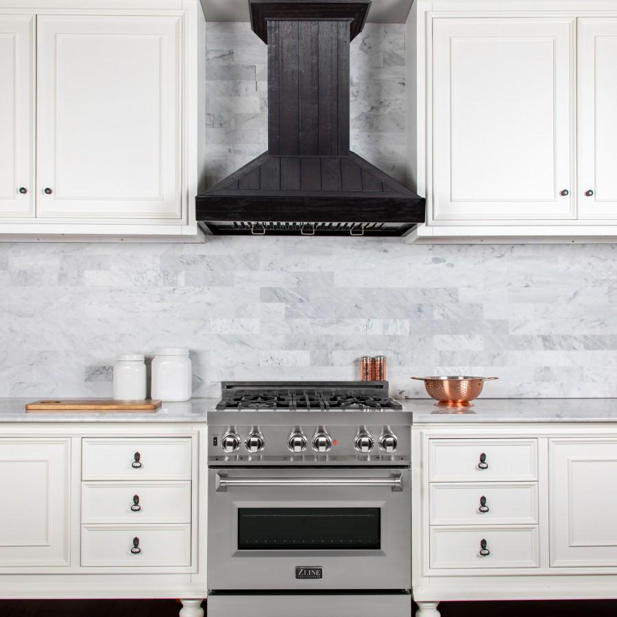 ZLINE Wooden Wall Mount Range Hood In Rustic Dark Finish - Includes Motor (KPDD) in a cottage-style kitchen with white cabinets.